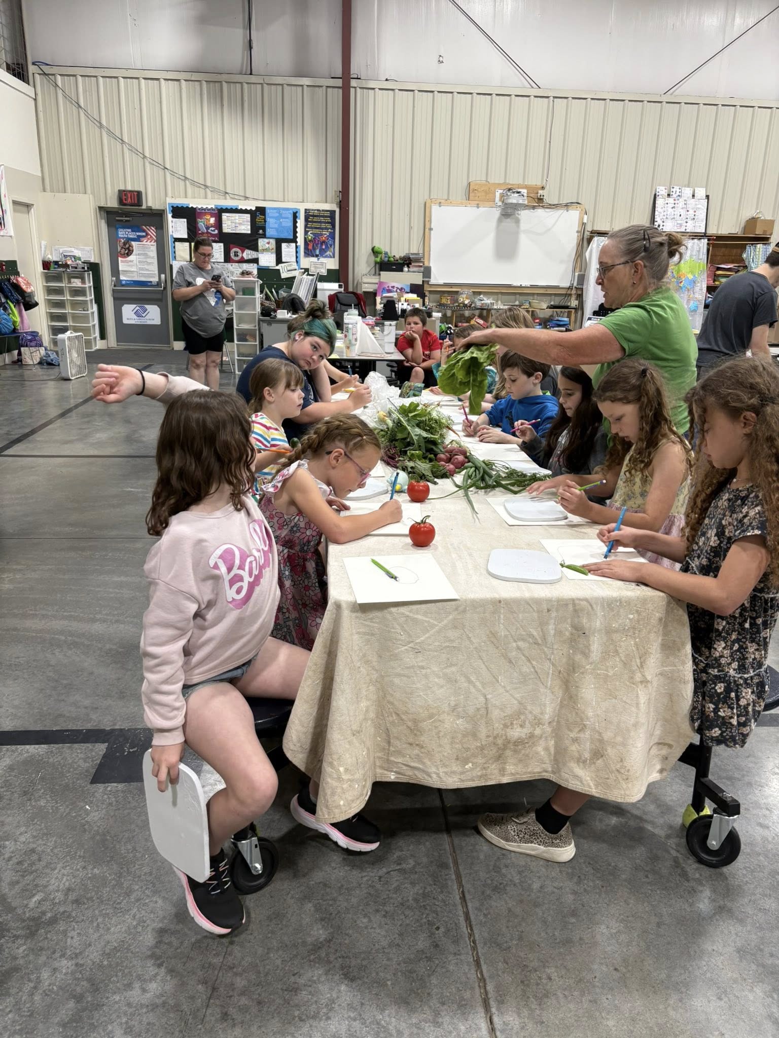 Kids gardening at AASC summer program Atchison Kansas